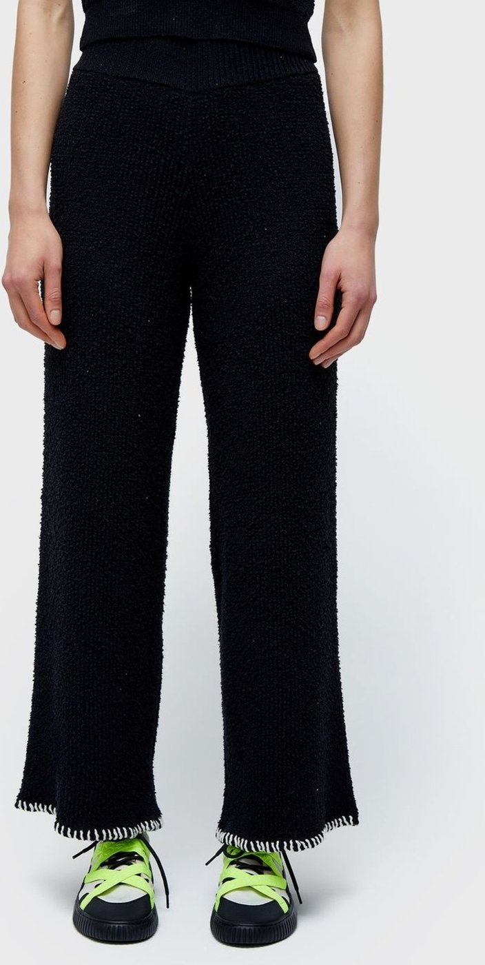 Calça tricot pespontos
