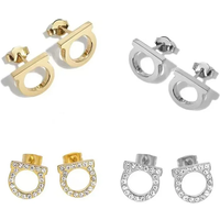 A pair of simple and luxurious zircon inlaid D-letter stainless steel earrings suitable for girls' daily wear