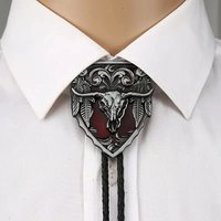 Big cow head western cowboy Tang grass pattern bolo tie leather fashion pendant men and women bolo tie tie rope tide
