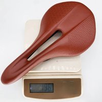 AliExpress TAOZIK TS004 Hollow Rail 142 mm Ultralight Breathable PU Glass Leather Bicycle Saddle