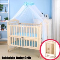 Foldable Pine Wood Kids Crib Have 4 Lockable Wheels, No Paint Baby Rocking Cradle, Portable Infant Cot with Mosquito Net