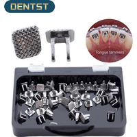 Dentst 50pcs Dental Orthodontic Tongue Tamer Lingual spikes Bondable Hinge Tongue Habit Bite Turbos Correction Button Bracket
