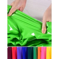 Tissu en cuir miroir PU élastique Super brillant, pour coudre des robes, conception PU imperméable par demi-mètre
