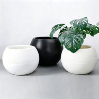 Indoor & Outdoor Oversized Faux Rock Round Plastic Planter Lightweight, durable plastic pot for garden and home flower planting