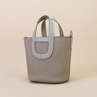 2025 New Leather Pig Nose Bucket Bag Handbag Top Layer Cowhide Single Shoulder Slant Cross Bag Vegetable Basket Bag Women's Bag