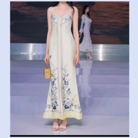 26 year summer French vacation style yellow printed suspender mid length dress