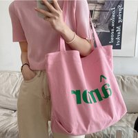 Versatile canvas bag for women, large capacity commuting tote bag, niche Instagram style single shoulder crossbody shopping bag