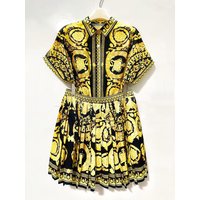 Retro geometric print lapel short-sleeved shirt two-piece set 2026 summer women's clothing + loose pleated skirt fashion suit