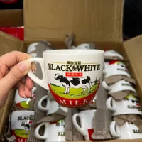High Quality Black And White Ceramic Coffee Cup Set Hong Kong Style Tea Restaurant Milk Tea Cup And Plate Cute Animal Pattern