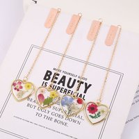 1 Pack of Exquisite Crystal Heart-Shaped Embossed Bookmarks with Alloy Pendant - Stylish Student Book fold Labels,Perfect Gift