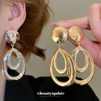 Silver Needle Smooth Water Drop Hollow Pendant Earrings Fashionable Versatile Stud Earrings Niche Design Earrings Women Jewelry