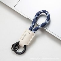 High-quality cowhide woven rope keychain pendant, car key chain, men's and women's high-end feel