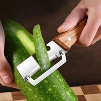 Kitchen and Household Stainless Steel Multifunctional Fruit Vegetable Peeler Slicer and Bottle Opener Tool for Daily Use