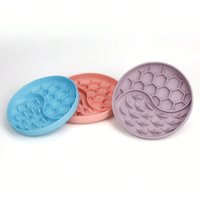The pet licking mat is made of food grade silicone and features a bowl with a dual design to prevent suffocation and slow eating