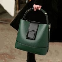Elegant Solid Color Bucket Bag with Adjustable Shoulder Strap Versatile Crossbody Handbag for Women, Lightweight with Zipper.