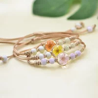 Fashion Retro Glass Ball True Flower Woven Bracelet Female Retro Charm Rope Chain Adjustable Bracelet Female Fashion Party Gift.