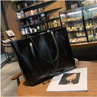 Elegant large-capacity cowhide handbag. Dual compartments & inner zip.messenger/shoulder bag for daily commute,shopping, travel.