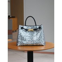 2025 European and American fashion new retro handbag niche design metal rope buckle large-capacity woven handbag leisure shoulde