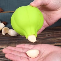 Silicone garlic skin remover, a kitchen tool for peeling garlic from food. It is a convenient, quick and easy-to-clean kitchen g