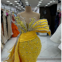 Golden Mermaid Evening Dresses with Feathers Side Train Customized Arabic Formal Sparkly Crystals Pageant Events Party Gowns