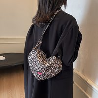Leopard print heart-shaped crossbody bag, a casual daily small backpack, 2026 new style fashion commuter bag