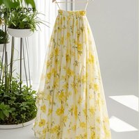 Yellow floral skirt women's 2025 summer new elastic waist design wears a unique A-shaped skirt