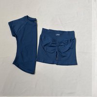 LOGO 2-delig yogapak Dames T-shirt met korte mouwen Perzik Hip Shorts Hoge elastische strakke sport Outdoor Fitness Toppak