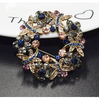 High-end exquisite temperament wreath color rhinestone brooch hollow inlaid zircon brooch