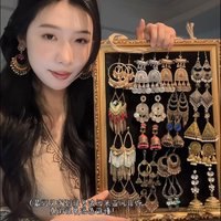 Elegant Vintage Ethnic Style Round Hollow Bohemian Elegant Niche Fashion Light Luxury Earrings Women