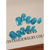 10Pcs Press on Nails Short Lake Blue Cat's Eye Fake Nails Includes 1 Sheet Adhesive Tabs & 1 Pc Mini File
