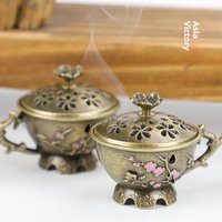 Plum Blossom Incense Burner With Handle Retro Plum Blossom Hollow Out Incense Stick Burner Zinc Alloy Small Craft Home Decor.