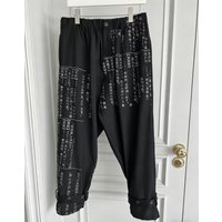 Pantalon décontracté imprimé à décharge de dictionnaire de conception originale TOP-YAMAMOTO avec style défilé en laine foncée