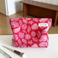 French niche makeup bag with large capacity and high appearance quality, women's hand-held bag for travel storage, fabric toilet