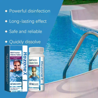 Swimming pool cleaning chlorine tablets; effervescent pool water treatment tablets for quick dissolution and decontamination.