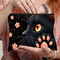 1 Piece Black Cat Print Makeup Bag, Decorated with Eye-Catching Orange Eyes and Cute Paw Patterns - Multifunctional Zipper Pouch for Women, Perfect Travel Zipper Storage Bag, Fun Birthday Gift
