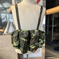 Outdoor vest with multi-functional six-pocket chest strap for portable hiking and weight-bearing.