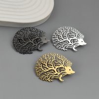 Original design hollow branch hedgehog stainless steel gold-plated brooch, waterproof and non-fading pin, men's suit badge