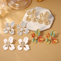 Metal wind zircon hollow flower earrings light luxury high-end irregular earrings women's silver needle oil drop earrings