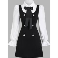 Black and white patchwork puff sleeved bow decorated double breasted dress