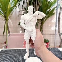 3D printed white mold of a muscular fitness male figurine. Uncolored model. Desktop trendy toy. Gift.