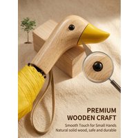 Little Yellow Duck Umbrella - Duck-shaped umbrella with pink handle. Also available in yellow. A great gift for parents and chil