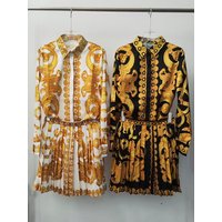 Ensemble deux pièces chemise droite à revers imprimé géométrique rétro et jupe plissée ample pour femme, collection été 2026