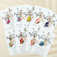9 pcs butterfly and daisy keychain sets, including a card featuring a dancing butterfly and decorative butterfly ornaments.