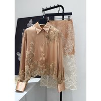 Luxurious champagne-colored lace set with hollowed-out floral embroidery, featuring an elegant long-sleeved shirt and skirt
