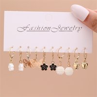 10pcs/set Minimalist Hollow Butterfly & Heart Set: A Delicate Earring Collection for Everyday Wear.