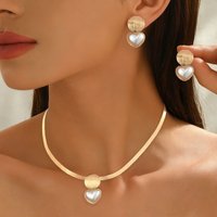 Stylish and elegant wide-faced flat snake chain imitation pearl love collarbone necklace stud earrings set peach