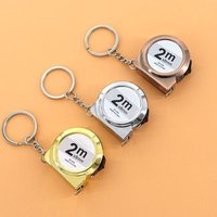 Hand sewing,A small home measuring tool suitable for DIY projects, Portable mini tape measure keychain made of brass material.