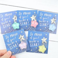 1pc/5pcs star keychain, featuring the phrase โIโm Proud of You,โ suitable for use as a backpack or wallet hanger.
