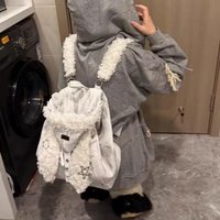 High-end cute fluffy rabbit ear hat backpack new style for autumn and winter 2026 large capacity versatile backpack for women