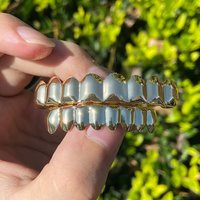 Unisex Glossy Finish Teeth Grillz Top Bottom Set Eco-friendly Copper Shiny Teeth Grillz Caps Gold Anti Slip Teeth Jewelry Party